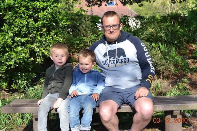 Andy Thorpe with his sons Ollie, 5, and Oscar, 3
