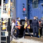 Tom Cruise prepares for an action scene at Levisham Station.