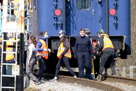 Tom Cruise prepares for an action scene at Levisham Station.