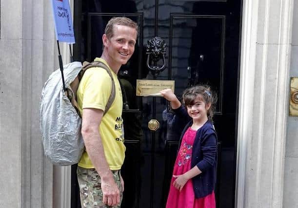 Major Chris Brannigan with daughter Hasti at 10 Downing Street