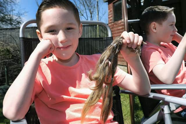 ...and after; Dara sporting his new haircut.