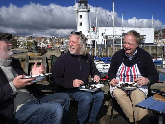 Kane Cunningham, John Oxley and Nick Taylor  enjoying some mussels to mark  the launch of Big Ideas by the Sea.