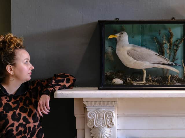 Martha Cattell with one of the exhibits in the new display due to open in May