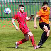 COUNTY CLASH: Lloyd Henderson is put under pressure by a Boro Rangers opponent during Saturday’s North Riding FA County Cup quarter-final clash. Picture: Alec Coulson