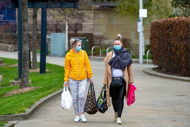 Women in masks pictured in Bradford as report outlines widening gender gap in the North of England as a result of the Covid-19 pandemic