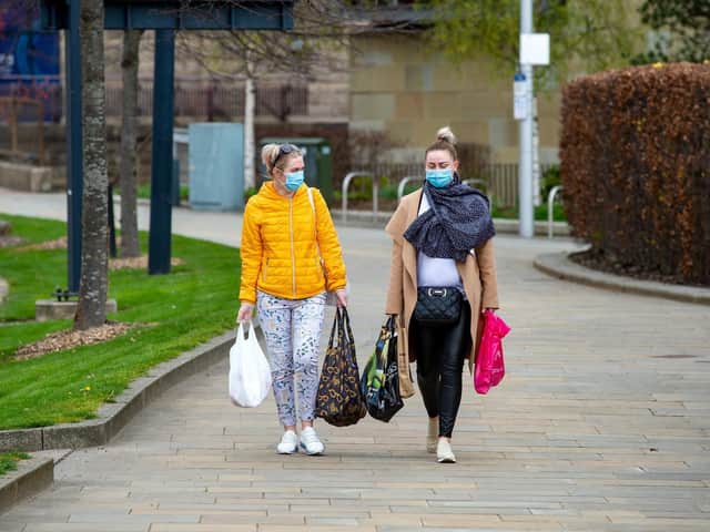 Women in masks pictured in Bradford as report outlines widening gender gap in the North of England as a result of the Covid-19 pandemic