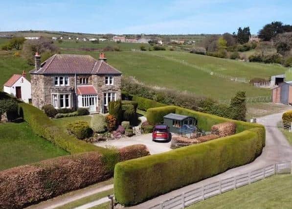 View of the villa and paddock