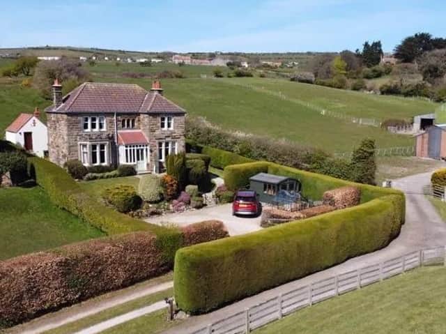 View of the villa and paddock