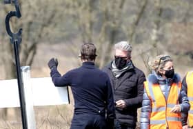 Director Christopher McQuarrie was pictured chatting on set with Tom Cruise.