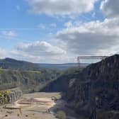 A huge bridge has been constructed over the edge of a disused quarry in Derbyshire.