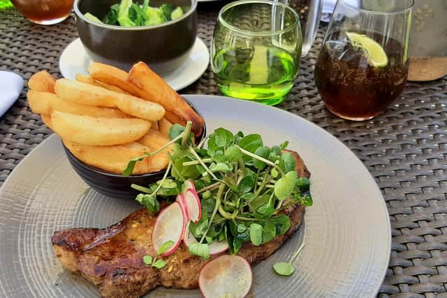 8oz sirloin steak and triple cooked chips.