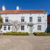 This Scalby home, converted from a Georgian house and a coach house, is highly individual, with lovely gardens.