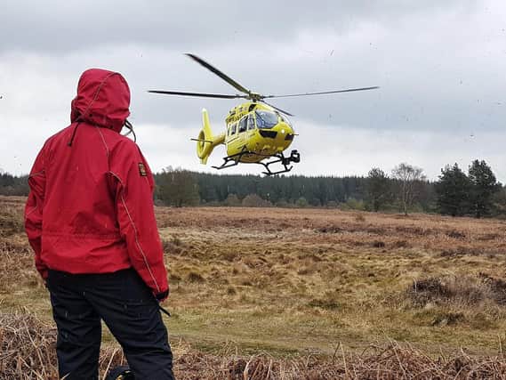An air ambulance was called to Dalby Forest this morning after a child fell 12ft from a rock.