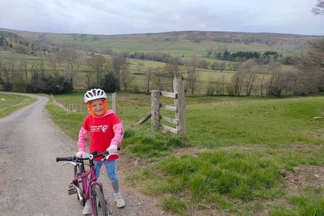 Lily Purtill with her bike.