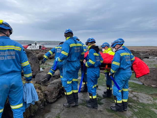 Coastguard crews and the coastguard helicopter helped an injured walker near Scarborough. Photo by Scarborough and Burniston Coastguard Rescue Team