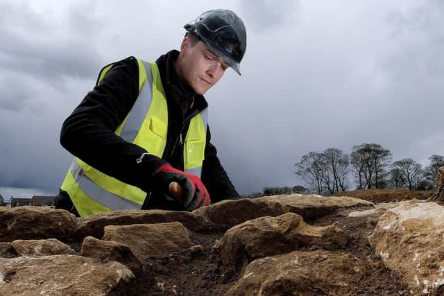 Trainee Field Archaeologist Corey Greening working at the site in Eastfield.