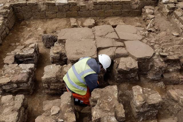 Field Archaeologist Martyn King works on the site.