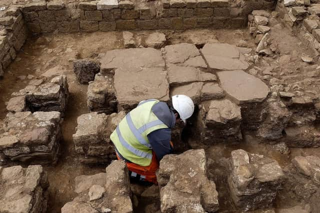 Field Archaeologist Martyn King works on the site.