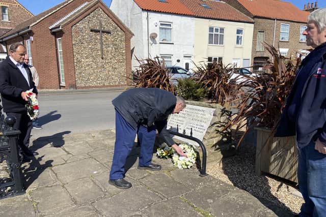 Councillor Vic Leppington lays wreath on behalf of Flamborough Parish Council. Photo: Mark Smales.