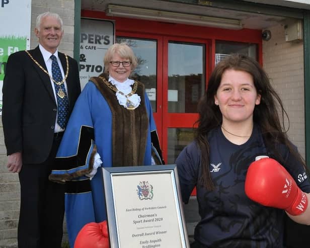 Boxer Emily Asquith received her award from council chairman Pat Smith.