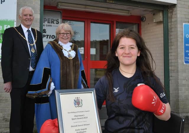Boxer Emily Asquith received her award from council chairman Pat Smith.