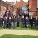 Teachers Penny Carver and Caroline O'Keeffe with pupils.