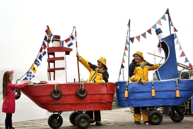 Chanelle Rae Ward Daggett meets Lee Threadgold and Dawn Dyson Threadgold in their sailing ships at Whitby's Fish and Ships Festival, 2019.