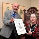 John Freeman receives his Honorary Freeman award from the Mayor of Whitby, Cllr Linda Wild.