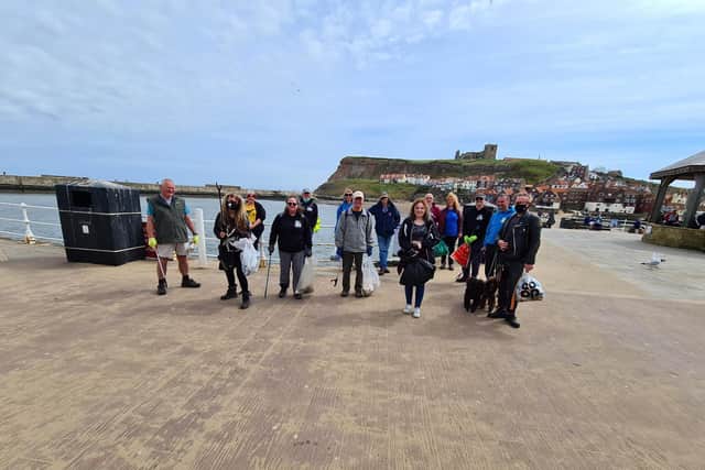 Volunteers at Whitby beach sweep.