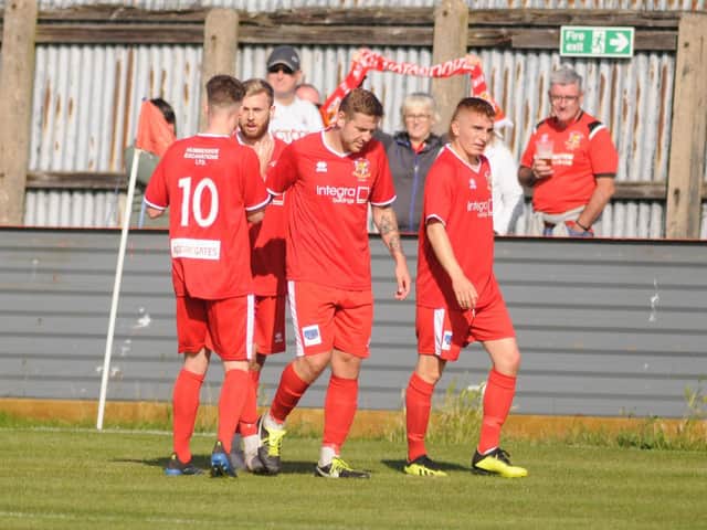 Bfrid Town celebrate a goal in the 2020-21 season