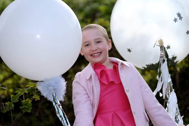 Evie Hodgson looks forward to her 9th birthday.
211928d