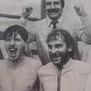 Whitby Town boss Tony Lee celebrates the cup final victory with, from left, Phil Linacre, Derek Hampton and Ronnie Sills