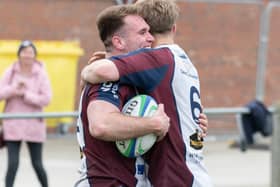 Aaron Thompson celebrates scoring the levelling try for the hosts

PHOTOS BY ANDY STANDING