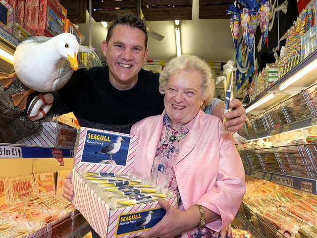 Miles Jackson with Mum Dawn who runs the store with the special seagull-flavoured rock.