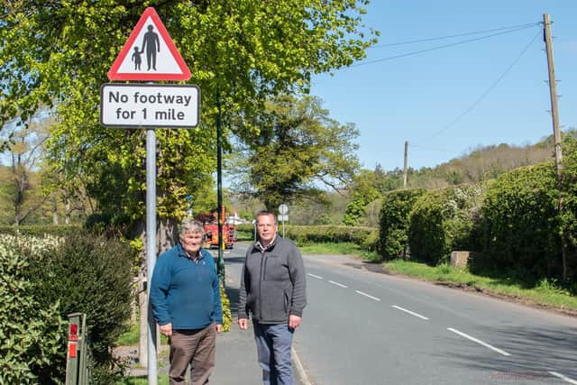 Councillors Clive Pearson and Joe Plant at the Briggswath end of The Carrs.