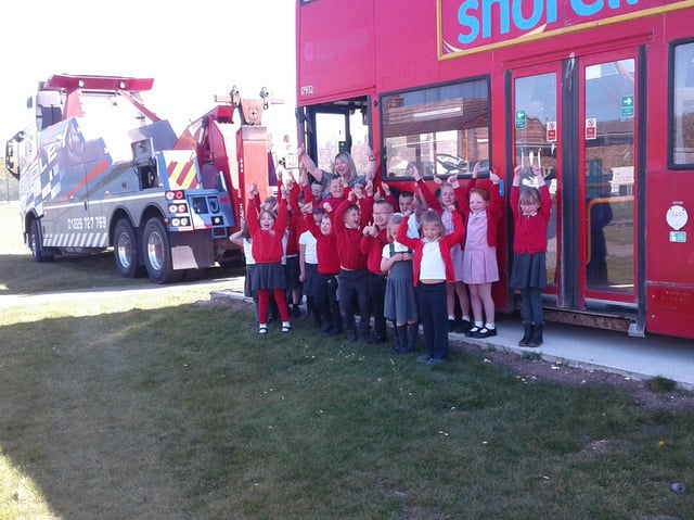 Children celebrate the bus arriving at school. Picture: EBOR Academy Trust
