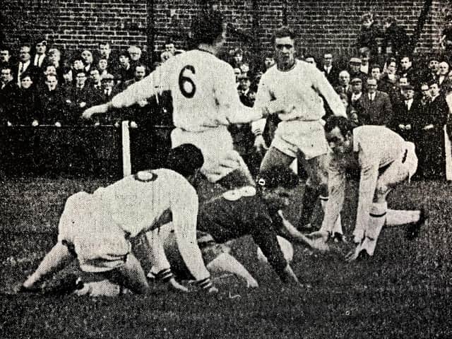 The incident that led to Whitby’s equalising penalty. On his knees is inside-right Bobby Veart, with Harry Dunn immediately behind. Covering the ball are Appleton, Sheppard and Laffey
