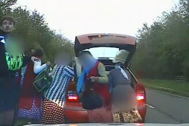 Police dashcam footage of the moment nine people emerge from a car pulled over in North Yorkshire