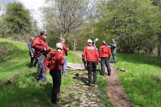 Scarborough and Ryedale Mountain Rescue Team helped paramedics move the patient.