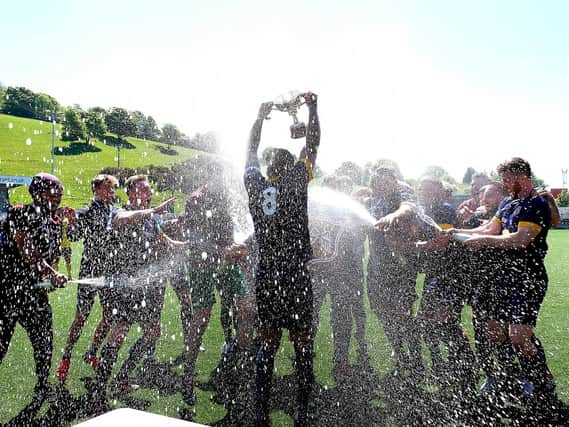 Angel's champagne celebrations after their final win over Trafalgar.

Photo by Richard Ponter.