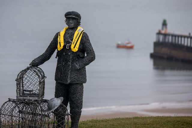Whitby sculptures dressed in Helly Hansen lifejackets to promote the importance of safety at sea.