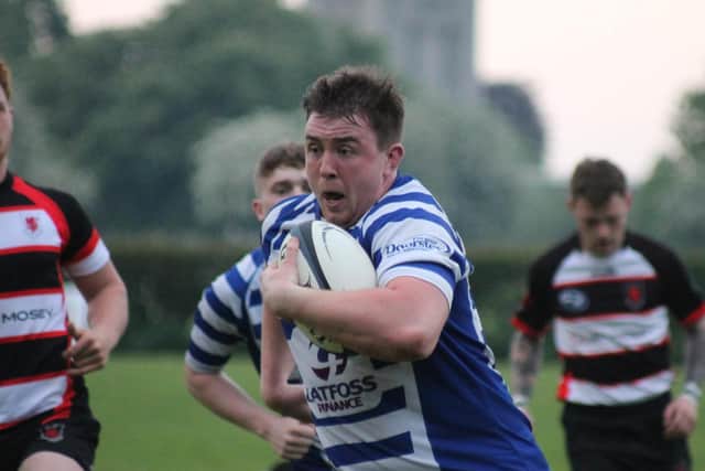 Sam Garvey on his way to scoring a try in the loss to Malton & Norton.
