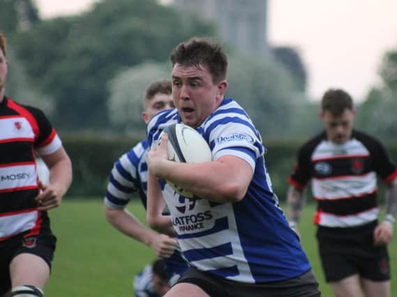 Sam Garvey on his way to scoring a try in the loss to Malton & Norton.