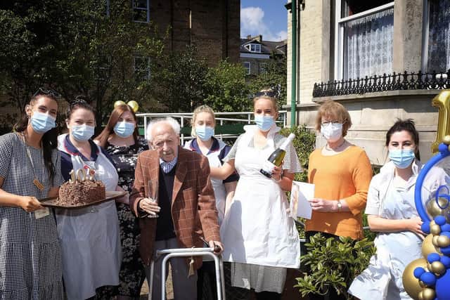 Staff at Ravensworth Lodge celebrate George’s birthday, from left, Kyrah Buckross, Jenny Walker, Heather Grisman, George Adams, Lauren Thomson, Kim Thomson, Christine Abbott and Katrina Penten.