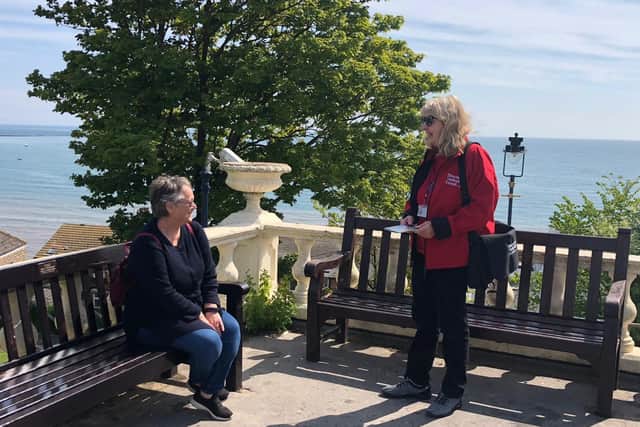 A welcome ambassador greets a visitor in Filey.