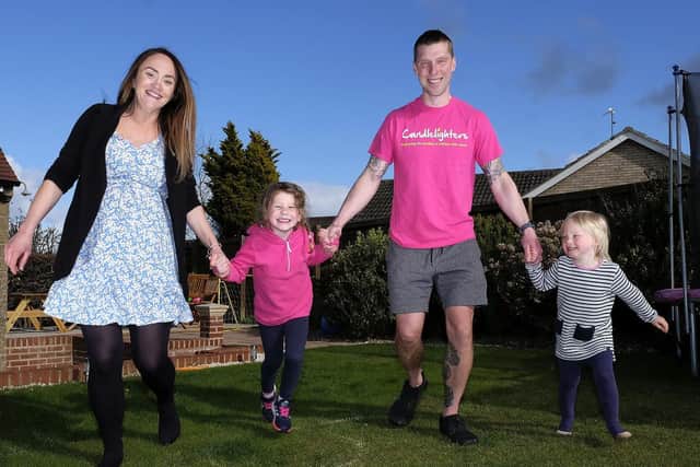 Jon Staniforth with wife Kylie and children Arya and Thea.