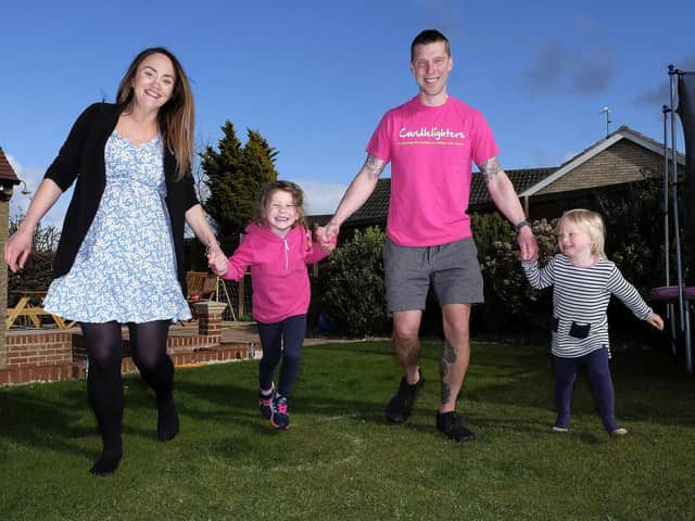 Jon Staniforth with wife Kylie and children Arya and Thea.