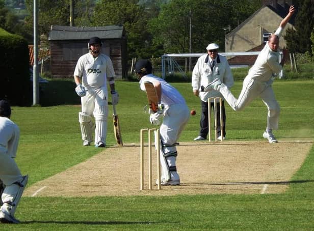 Tom Bumby, above in bowling action, hit 27 in Heslerton's win