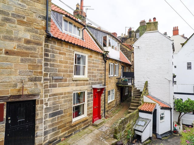 View of the approach to the cottage in the scenic seaside village