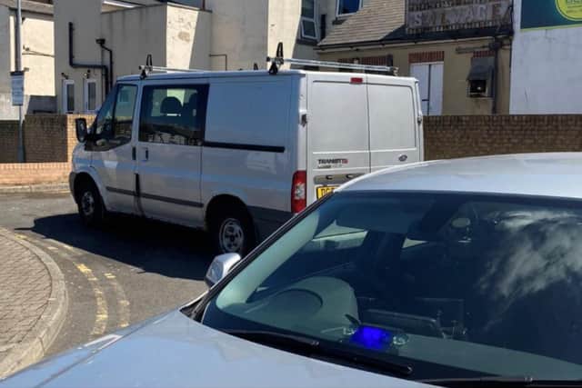 Nearby, a van was also seized by police after being stopped as part of a seatbelt safety campaign.